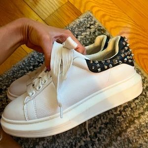 Steve Madden platform tennis shoes with silver studs on heels